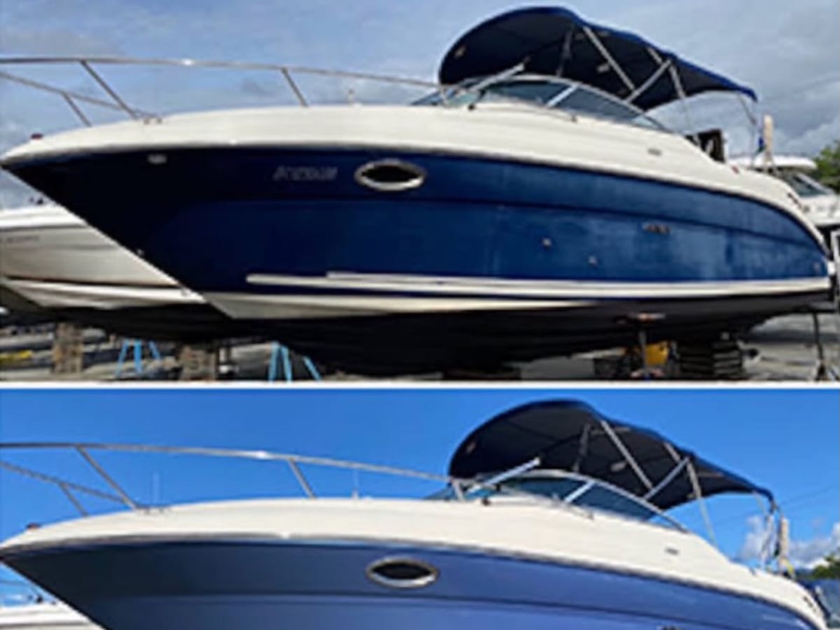 The same boat before and after wrapping, faded hull above and fresh blue below
